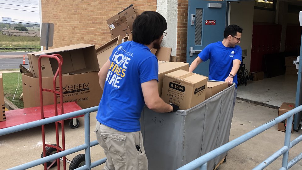 buckner international delivers supplies for disd students in need
