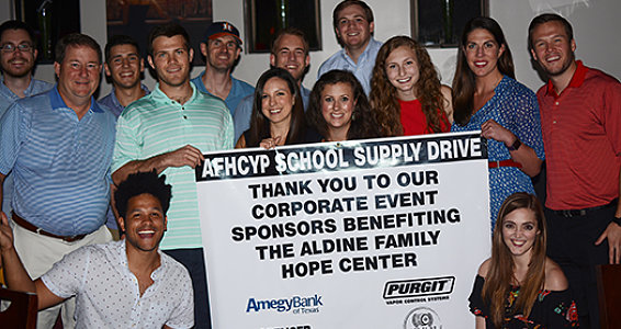 Young professionals raise $8,000 for school supplies