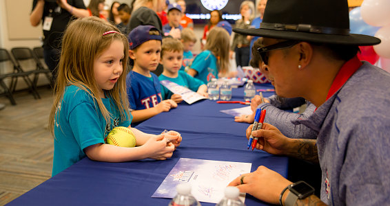 Ranger pitchers bring smiles and fun to Buckner Family Hope Center
