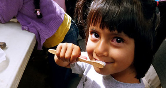 Bamboo toothbrushes give kids their smiles back