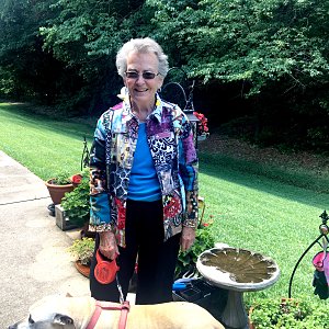 Lee Rose of Buckner Westminster Place with her dog, Aries.