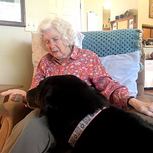 Joanne Payne of Buckner Westminster Place with her dog, Gracie.