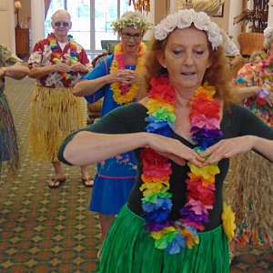 Learning to hula dance at the Calder Woods luau.