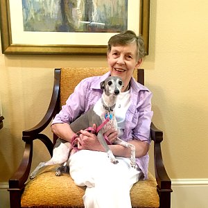 Kathy Hancock of Buckner Westminster Place with her dog, Cookie.