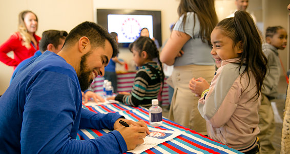 Friday photo: Texas Rangers visits Family Hope Center in Longview