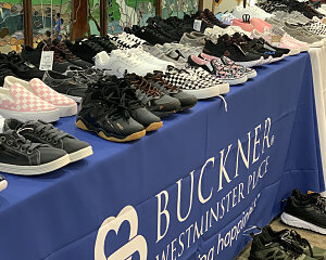 buckner westminster place donates shoes for vulnerable children