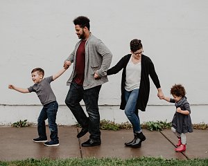 family of four walking at the street 2253879