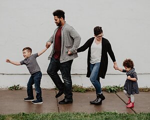family of four walking at the street 2253879