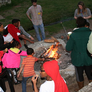 buckner-family-pathways-enjoys-campfire-during-retreat.jpg