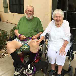 Bernie and Sybil Stratman of Buckner Villas with their dog, Big’n.