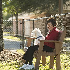 Marion Takehara of Parkway Place with her dog, Mateo.