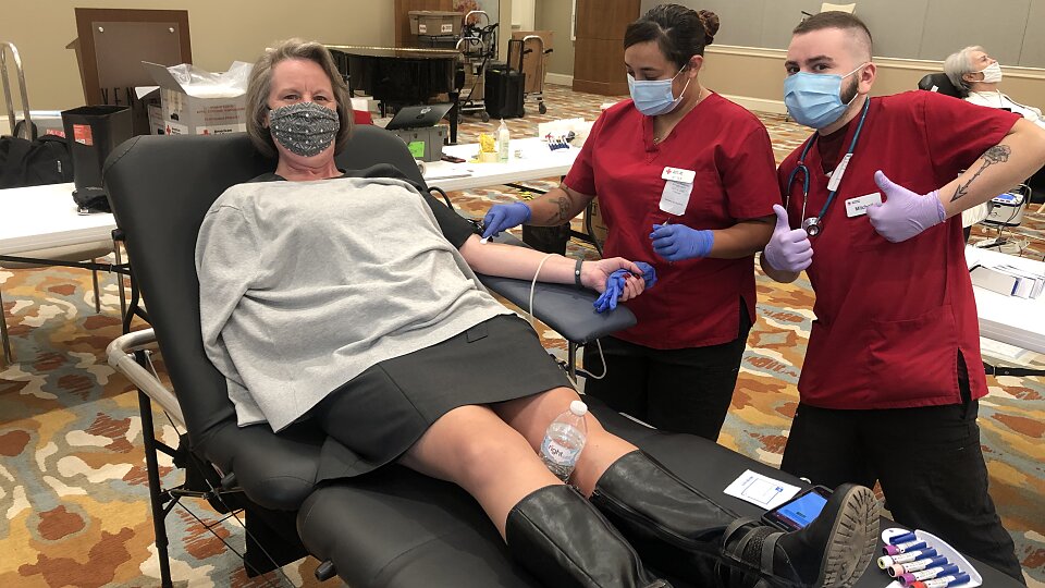 red cross staff work the blood drive at ventana by buckner