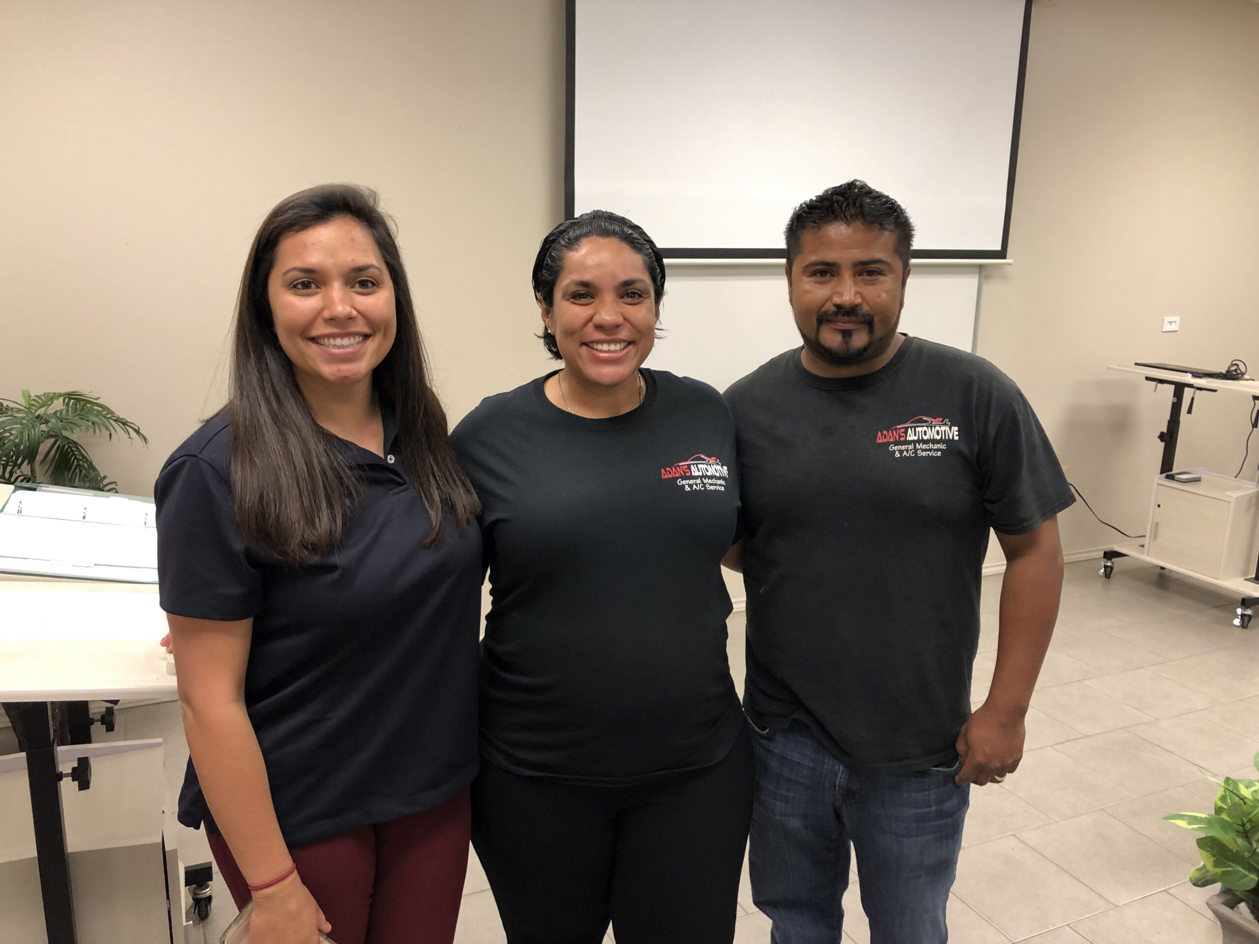 anjali-and-adan-santiago-with-buckner-program-supervisor-charlotte-navarro-1