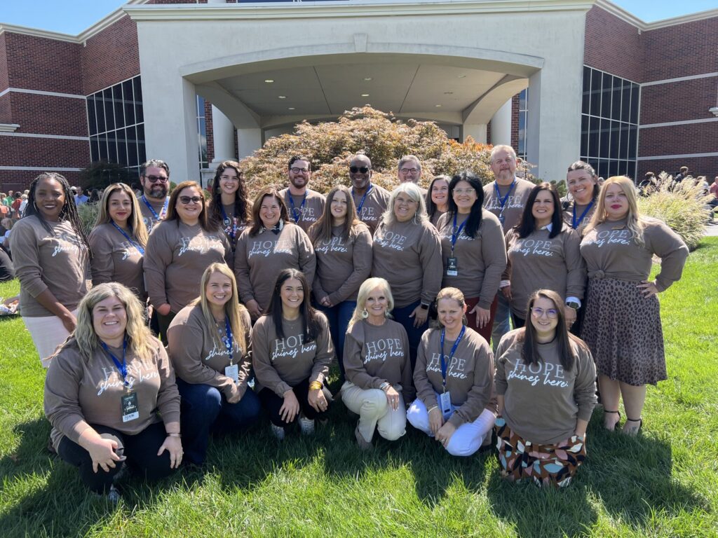 buckner-staff-together-at-cafo-scaled