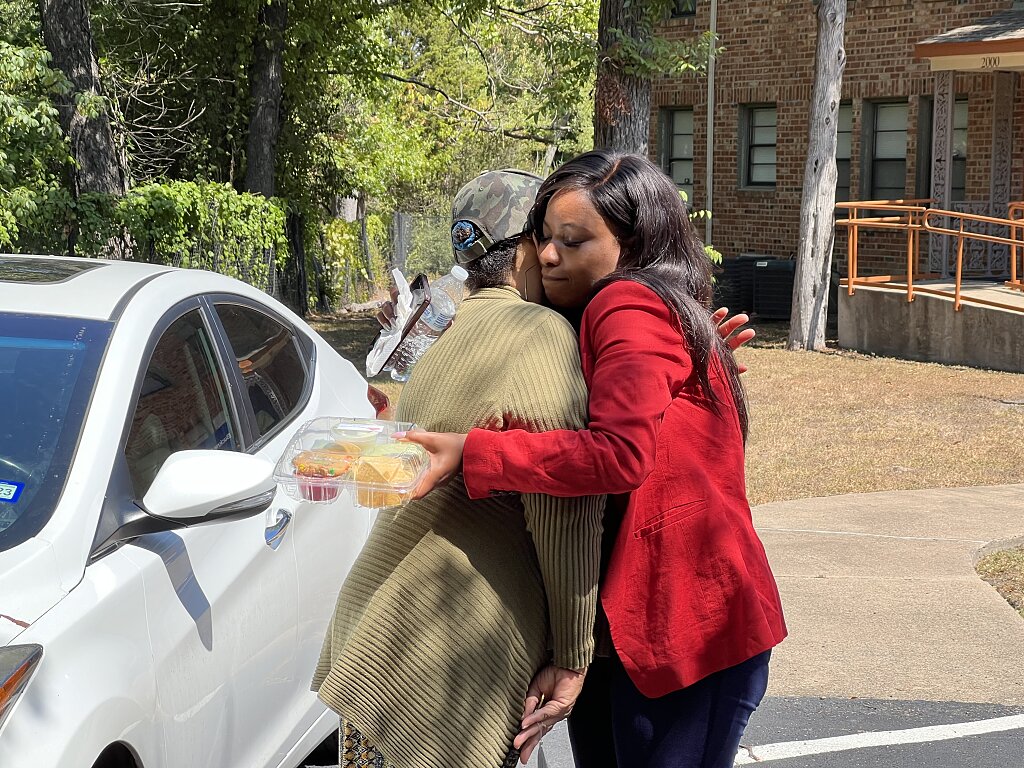 Congresswoman Crockett embraces Buckner client