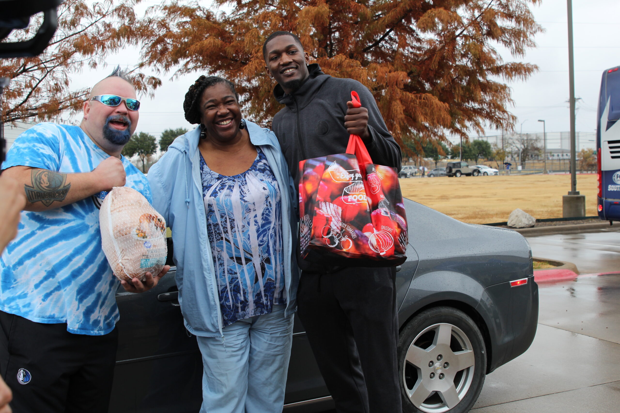 dorian-finney-smith-gives-out-thanksgiving-turkeys-at-buckner