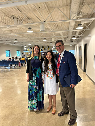 Albert Reyes celebrating new graduates