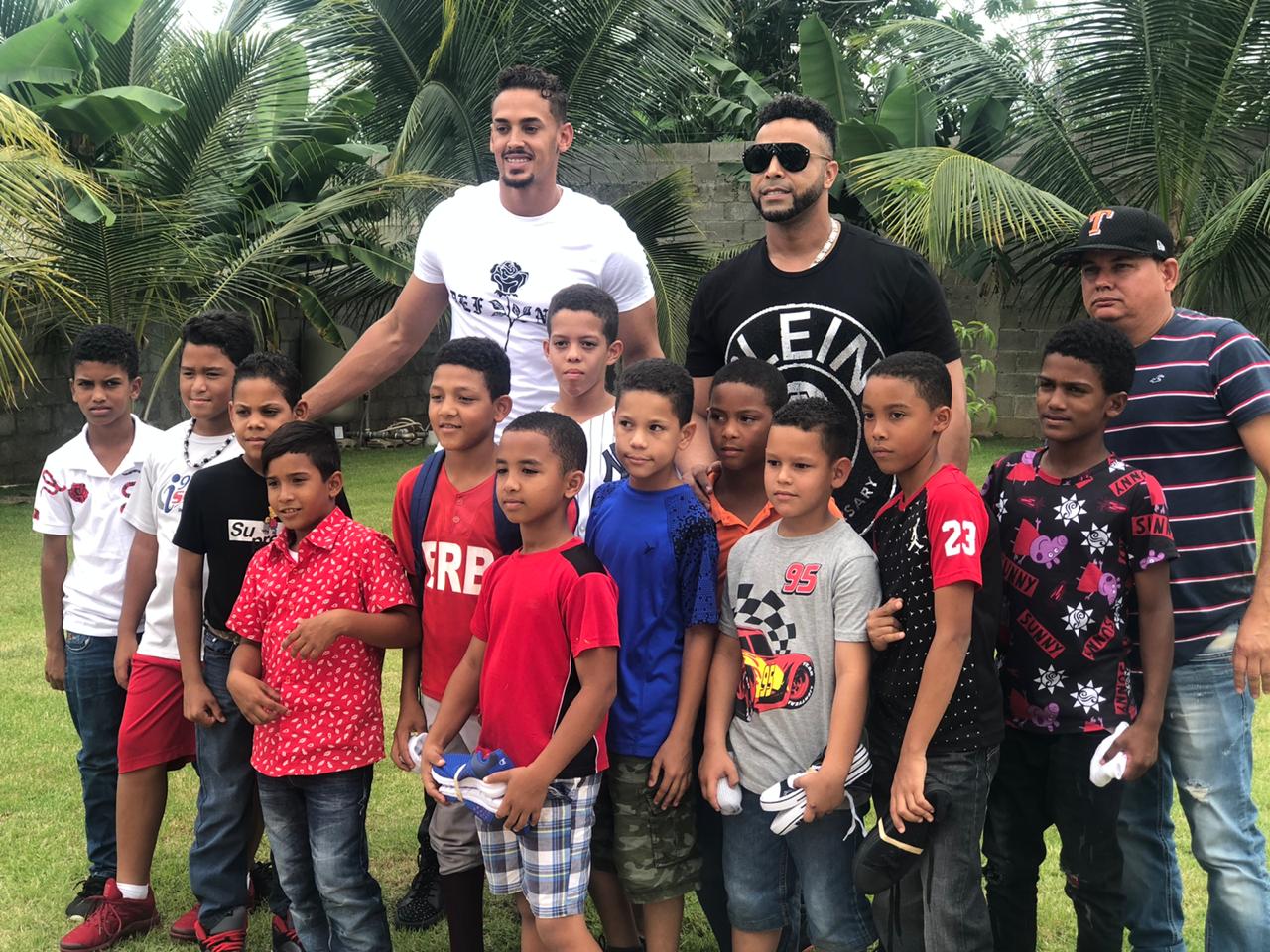 ronald-guzman-and-nelson-cruz-deliver-shoes-to-children-in-dominican-republic