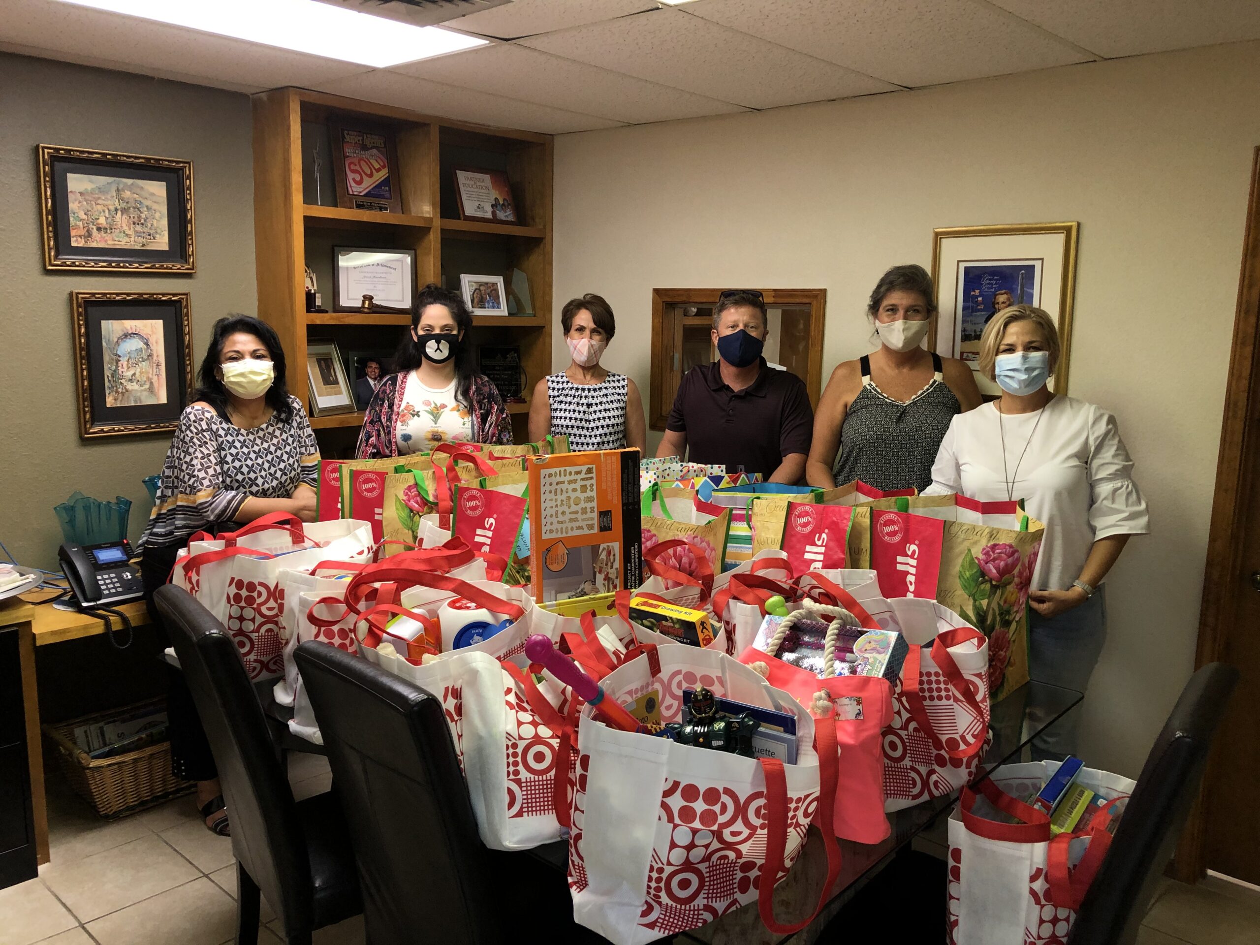 star-properties-real-estate-packed-backpacks-with-books-and-toys-for-buckenr-foster-children