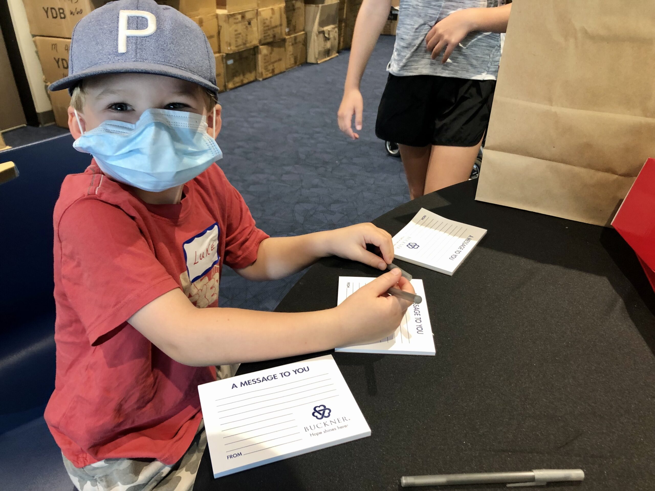 volunteers-helped-families-with-supplies-at-bachman-lake